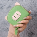 Green piglet shaped accordion card holder in pebble leather with a secure gold zipper - Green