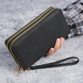 Women's black long double zipper wallet with embossed G-pattern and wrist strap - Black