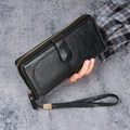 Long black oil wax PU leather wallet for women with zipper closure and wrist strap - Black