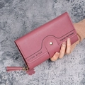 Dusty pink long leather wallet for women with tassel charm and wavy stitching detail - Deep Pink