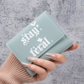 Short tri-fold light blue wallet with stay feral print and bat patterns for women - Light Blue