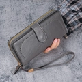 Long grey oil wax PU leather wallet for women with perforated design and wristlet strap - Gray