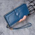 Blue oil wax PU leather long wallet for women with cutout detailing and gold zipper - Blue