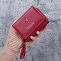Red PU leather mini wallet featuring gold deer logo and fashion classic text - Burgundy