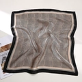 Elegant houndstooth silk square scarf in black and white with a glossy satin finish - Classic Houndstooth