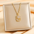 Luxurious gold titanium necklace with hollow flower pendant and sparkling cubic zirconia - White Zirconia
