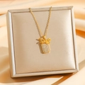 Collana con fiocco dorato e pendente rettangolare con cristalli su scatola regalo - Fiocco Dorato (8547)