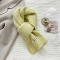 Close-up of knit wool scarf with a vegetable label and fuzzy mohair-like texture - 20*170cm / Milky Yellow