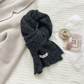 Detail of dark grey wool knit scarf with soft brushed texture and white design label - 20*170cm / Black