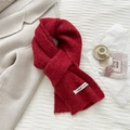 Detailed texture of red wool knit scarf with a white VEGETABLE woven label - 20*170cm / Red