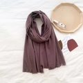 Deep burgundy cashmere-style scarf with fine tassels on a minimalist white backdrop - Purple