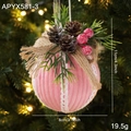Pink striped fabric Christmas ball ornament with pinecones and berries on a tree - Pink Christmas Ball