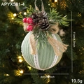 Green corduroy Christmas ball ornament with white lace, pine cones, and red berries - Green Christmas Ball