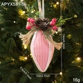 Pink fabric Christmas stocking ornament with pine cones and red berries on a tree - Pink Pear