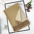 Double-sided camel and cream cashmere-style scarf with tassel edges shown flat - Camel and Beige