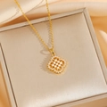 Golden honeycomb clover necklace with pearls and zircons on a luxury silk background - Gold Necklace (8798)