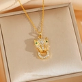 Collana con testa di leopardo dorata con zirconi bianchi e occhi in gemme verdi - Collana Oro