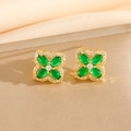 Detailed close-up of clover flower stud earrings with green zircon and gold plating - Green Zircon Clover Stud Earrings (8460)