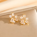 Luxuriöse vergoldete geometrische Ohrstecker mit Zirkonia-Steinen für Damen - Goldene Ohrringe
