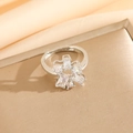 Detailed view of silver adjustable flower ring with sparkling white cubic zirconia stones - Silver Ring