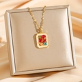 Exotic titanium steel necklace with a colorful zircon square pendant on silk background - Gold Colorful Zirconia Square Tag (8065)