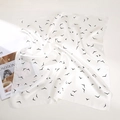 Elegant white silk square scarf with black bird patterns and smooth silk texture - Bird Flock White