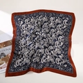 Silk square scarf featuring navy paisley pattern and caramel brown satin borders - Navy Blue Paisley