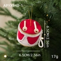 Red and white Christmas drum ornament with drumsticks and gold cord hanging on tree - Red & White