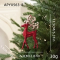 Red glitter reindeer Christmas ornament hanging on tree branch with golden string - Elk Style