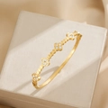 Gold titanium steel clover bracelet with sparkling diamonds and spring opening mechanism - Clover Bangle (SZ1) / Gold