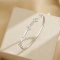 Silver stainless steel clover bangle with crystals displayed on a premium jewelry box - Clover Bangle (SZ1) / Silver