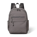 Minimalist lightweight dark grey backpack with multiple compartments for travel and daily use - Space Gray