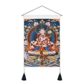 Detail of Thangka wall tapestry featuring Buddha on lotus seat with golden tassels - 35x50cm / Lotus Buddha (Style 6)