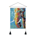 Detail of colorful elephant canvas tapestry with wooden rod and black tassel decor - 35x50cm