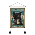 Detail of vintage cat tapestry with wooden rod, black tassels and Don't Tell Me What To Do text - 35x50cm