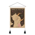 Detail of vintage cat and moon tapestry with black tassels and wooden hanging rod - 35x50cm