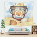 Detail of beach themed tapestry with North Shore Retreat seashell bucket on living room wall - North Shore Retreat (Style 13)