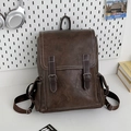Vintage brown PU leather backpack with contrast stitching and buckle flap for daily travel - Brown