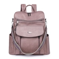 Detail of dusty rose PU leather backpack with colorful woven strap and multiple zippers - Pink