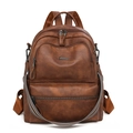 Detail view of brown vintage PU leather backpack with colorful striped shoulder strap - Two-tone Brown Coarse Grain