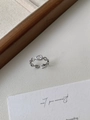 Detailed close-up of water drop zircon ring with hollow chain band on leather background - Silver Chain Water Drop Zirconia Ring / Silver