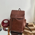 Minimalist deep brown PU leather backpack with vintage texture and flap closure design - Reddish Brown With Pendant