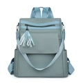 Zaino in ecopelle intrecciata con nappa e spallacci regolabili in finitura grigio-blu - Blu