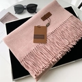 Pink cashmere feel scarf with fringe trim and leather brand tag on black surface - 70*200cm / No.38 Heather Pink