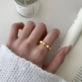 Elegant gold bamboo knot ring with pavé zircon stones worn on index finger - Adjustable / Gold