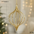 Gouden glitter holle uivormige kersthanger hangend aan een feestelijke kerstboom - Gouden druppelbal