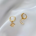Macro detail of asymmetric star and crescent moon earrings with pave zircon crystals - Hexagram Moon Pave Earrings - Gold