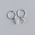 Detail of silver star and moon drop earrings with sparkling pavé cubic zirconia - Sunburst Moon Earrings - Silver