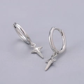 Macro view of S925 sterling silver stamp on minimalist star charm hoop earrings - Cross Star Earrings - Silver