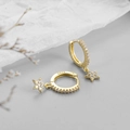 Macro detail of gold plated S925 sterling silver star hoop earrings with sparkling cubic zirconia - Mini Pentagram Hoop - Gold